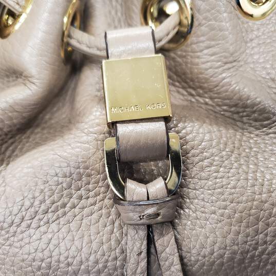 Michael Kors Brown Pebble Leather Drawstring Hobo Handbag image number 4