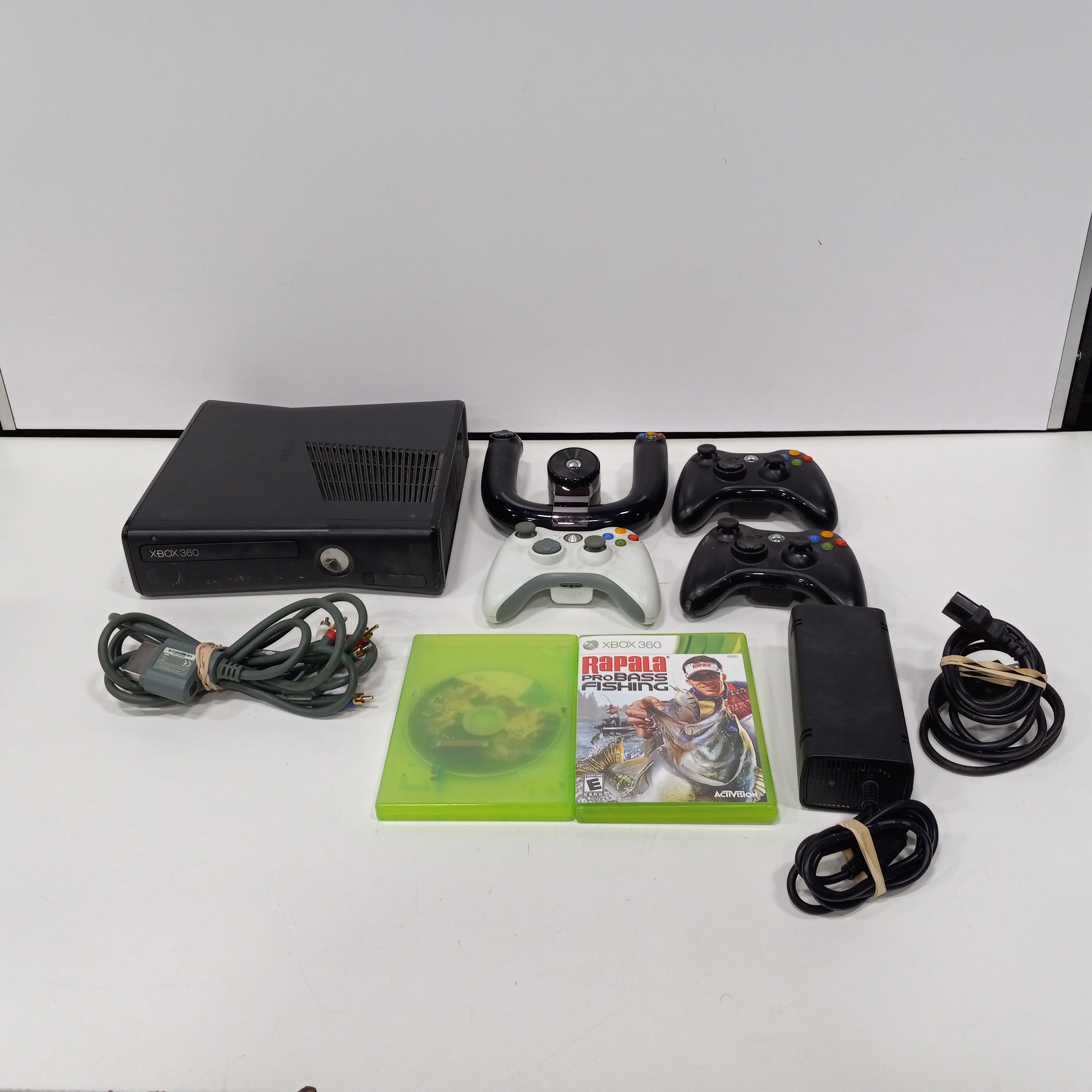 Buy the Microsoft Xbox 360 Video Game Console w/Cables and 4 Controller And  2 games
