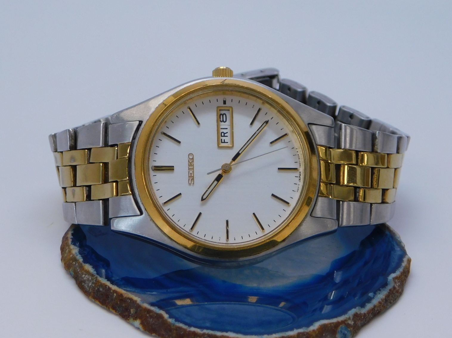 the Seiko Two Tone Steel 7N43-9048 Day Date Men's Watch | GoodwillFinds