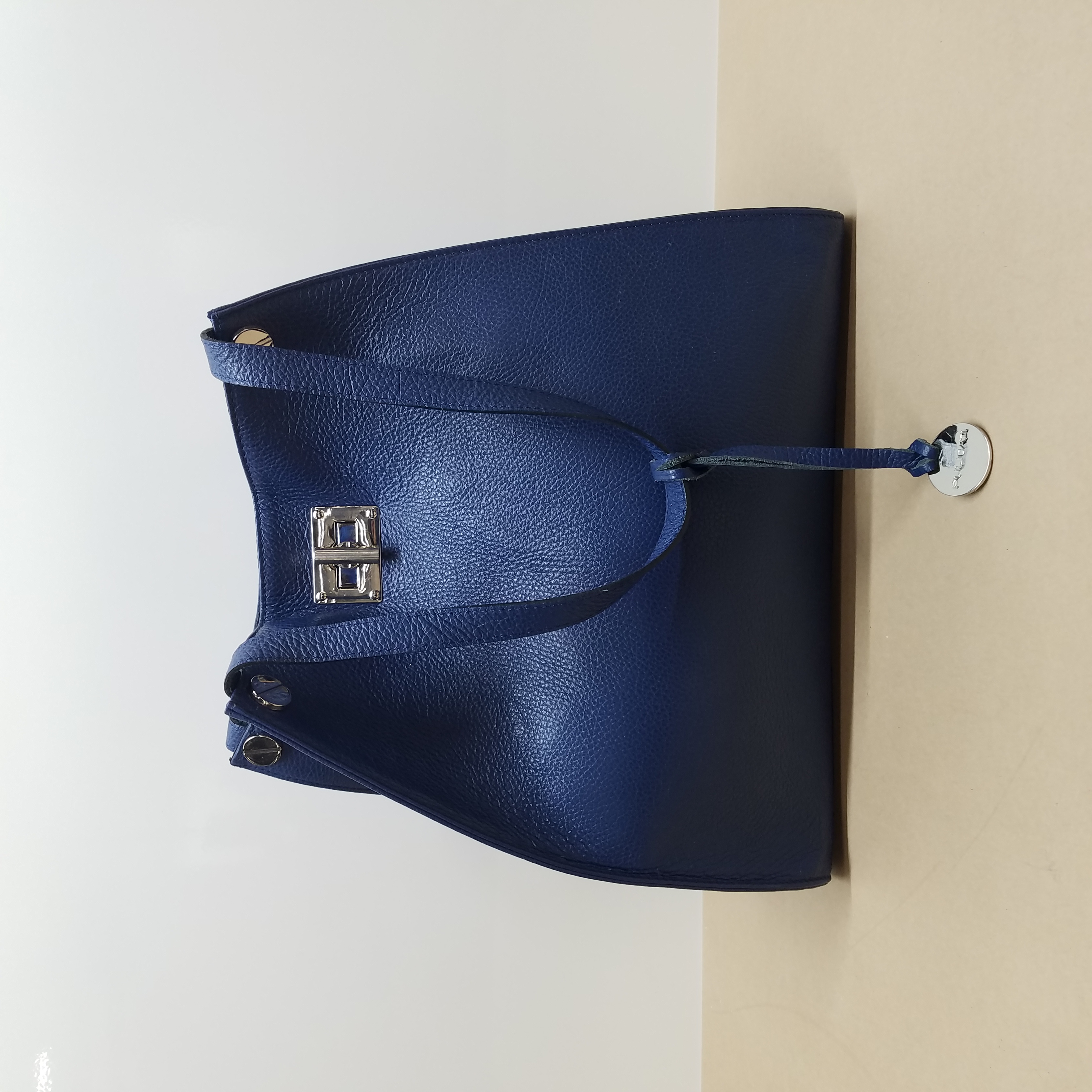 Buy the Pulicati Blue Leather Turnlock Tote Bag | GoodwillFinds