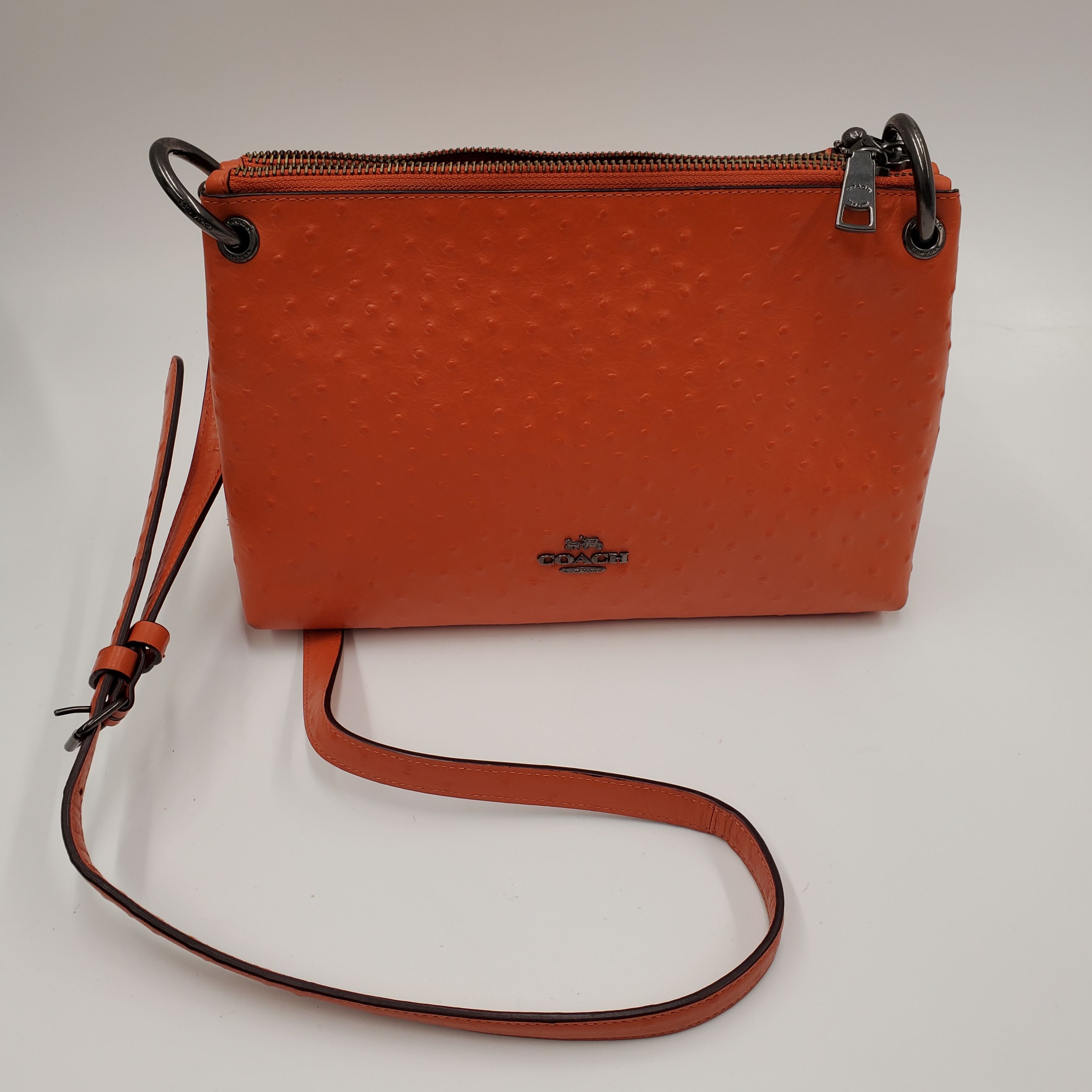 Buy the Coach Mia Crossbody Bag Purse Dark Orange Ostrich Embossed Leather  & Black Antique Nickel Hardware F76644