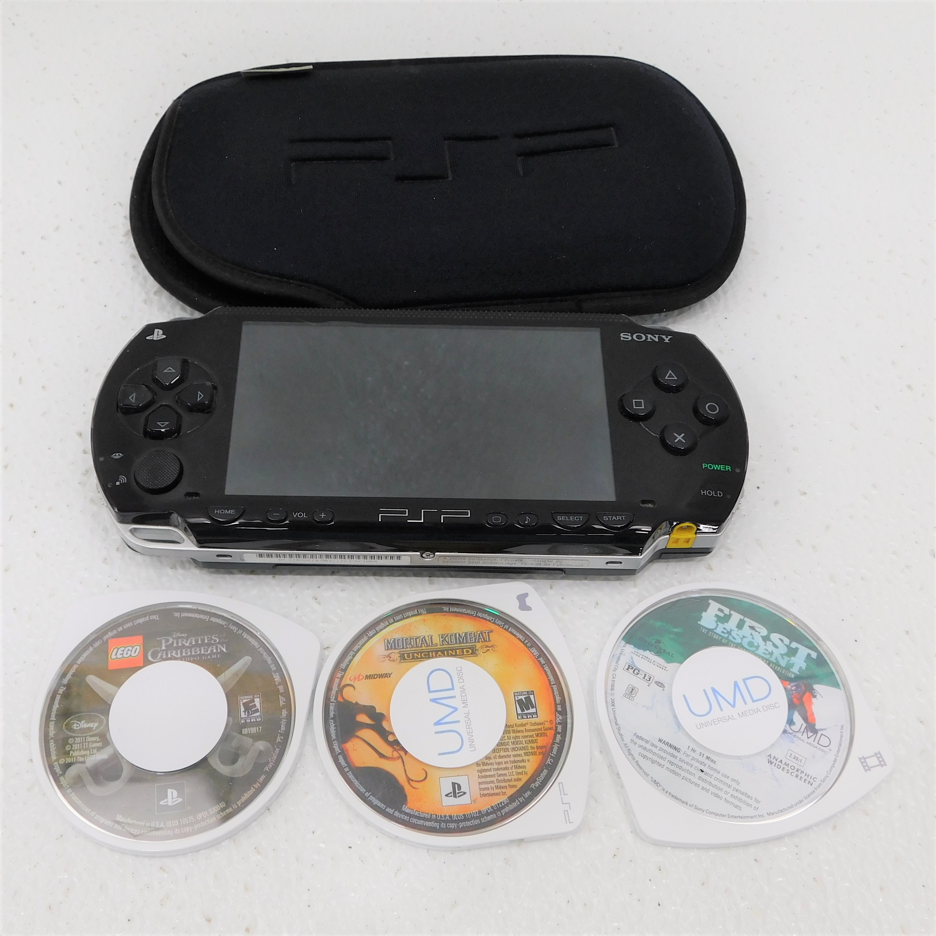 Buy the Sony PSP PlayStation Portable w/ 3 games | GoodwillFinds