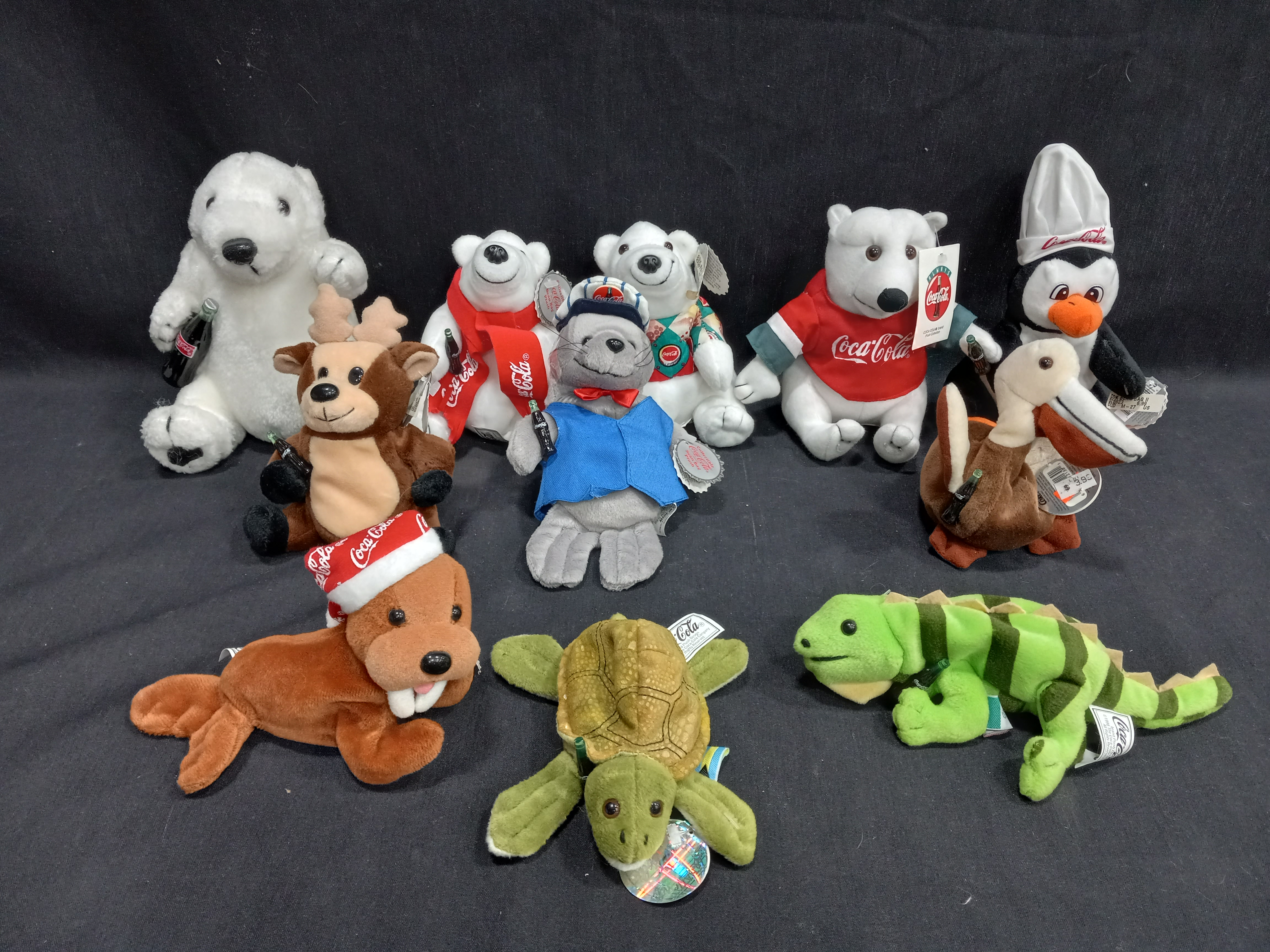 Buy the Bundle of 11 Coca-Cola Plush Animals | GoodwillFinds