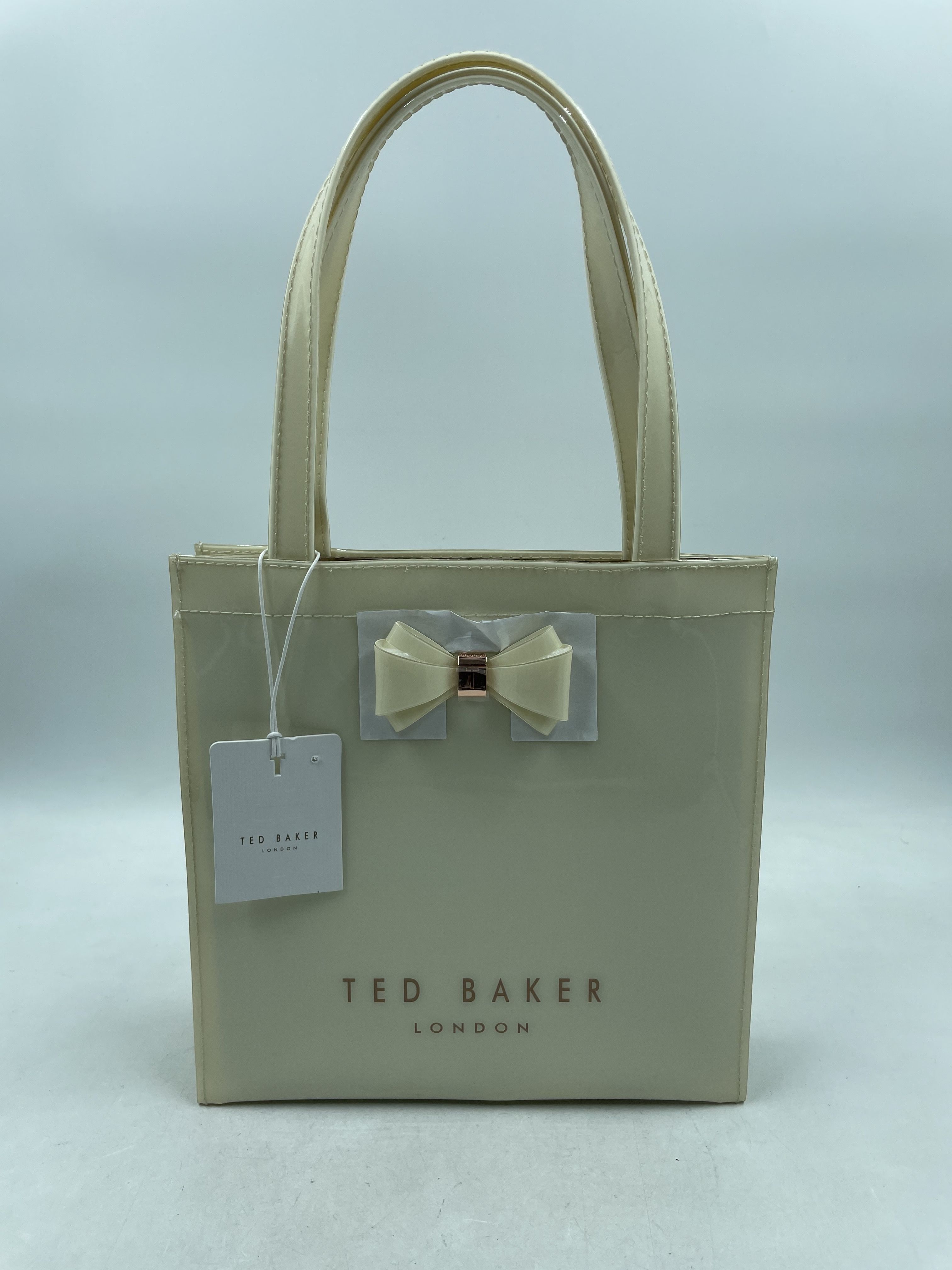 Buy the Authentic Ted Baker Aracon Bow Small Ivory Tote | GoodwillFinds