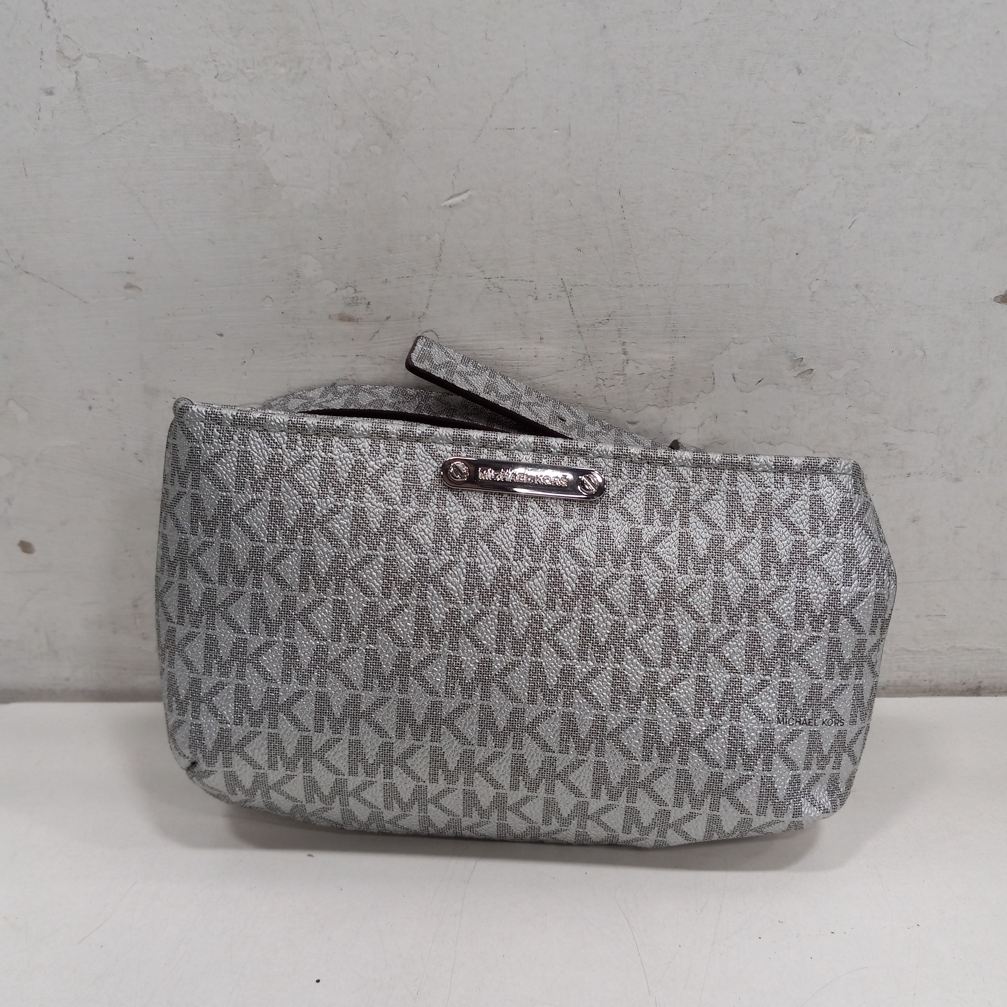 Buy the Michael Kors Silver Handbag | GoodwillFinds