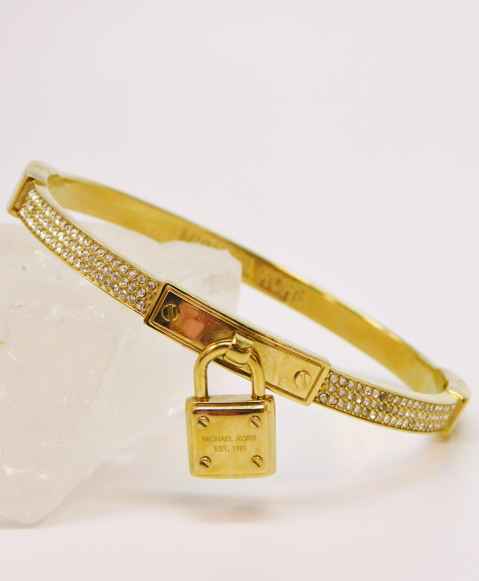 Buy the Michael Kors Designer Icy Gold Tone Padlock Hinged Bangle Bracelet  | GoodwillFinds