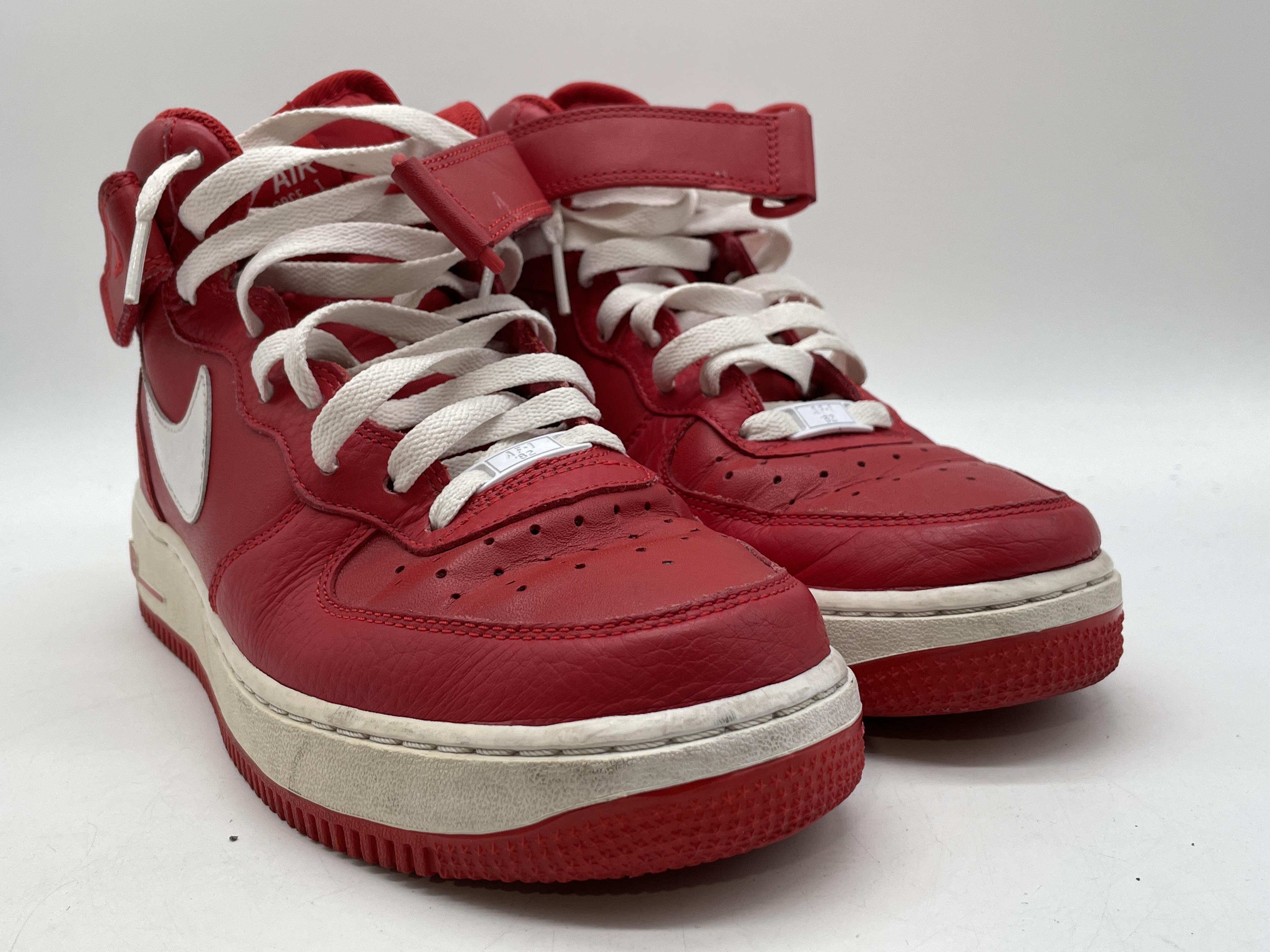Buy the Mens Air Force 1 White Red Leather Lace Up Mid Top Sneaker