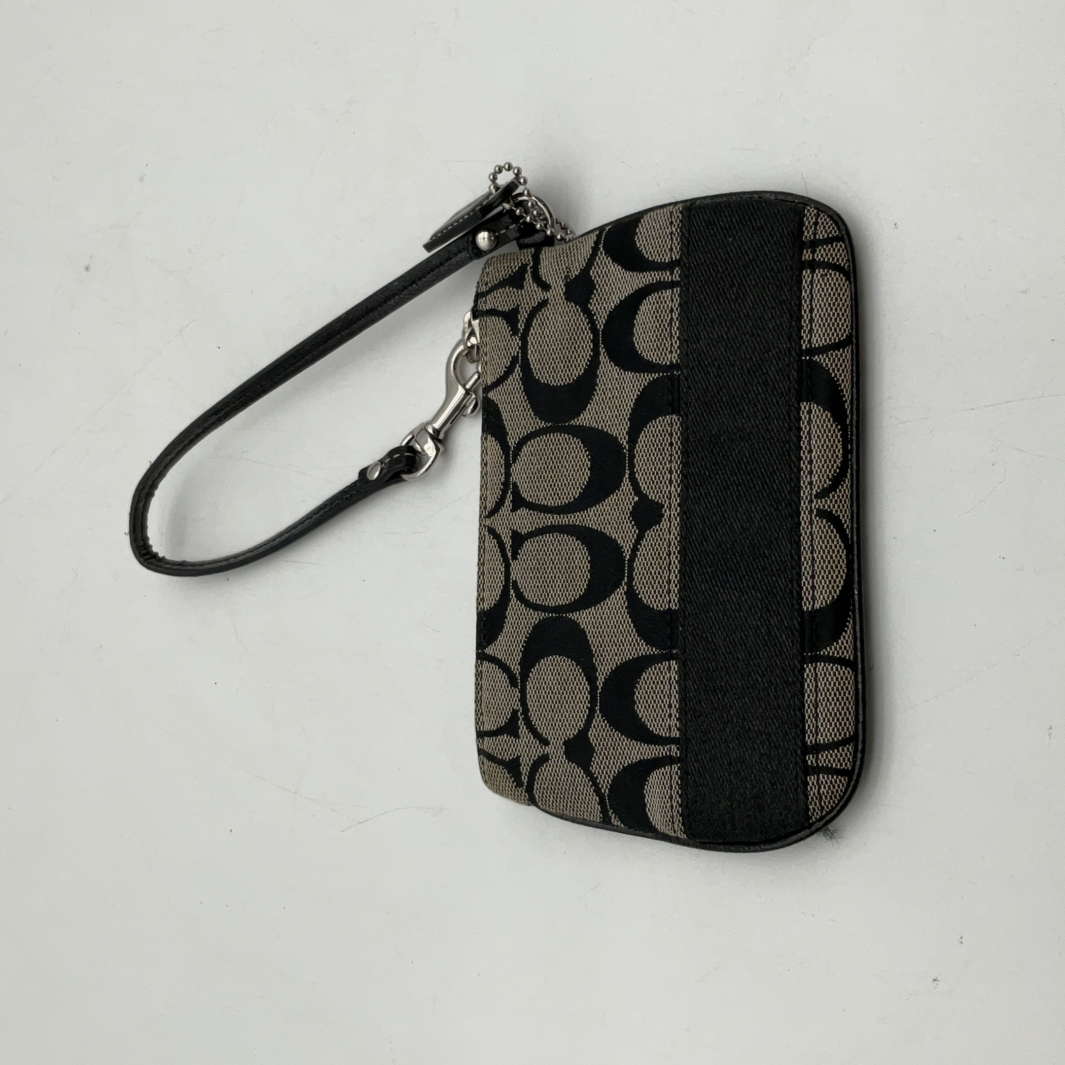 Buy the Womens Gray Black Canvas Signature Print Bag Charm Zipper