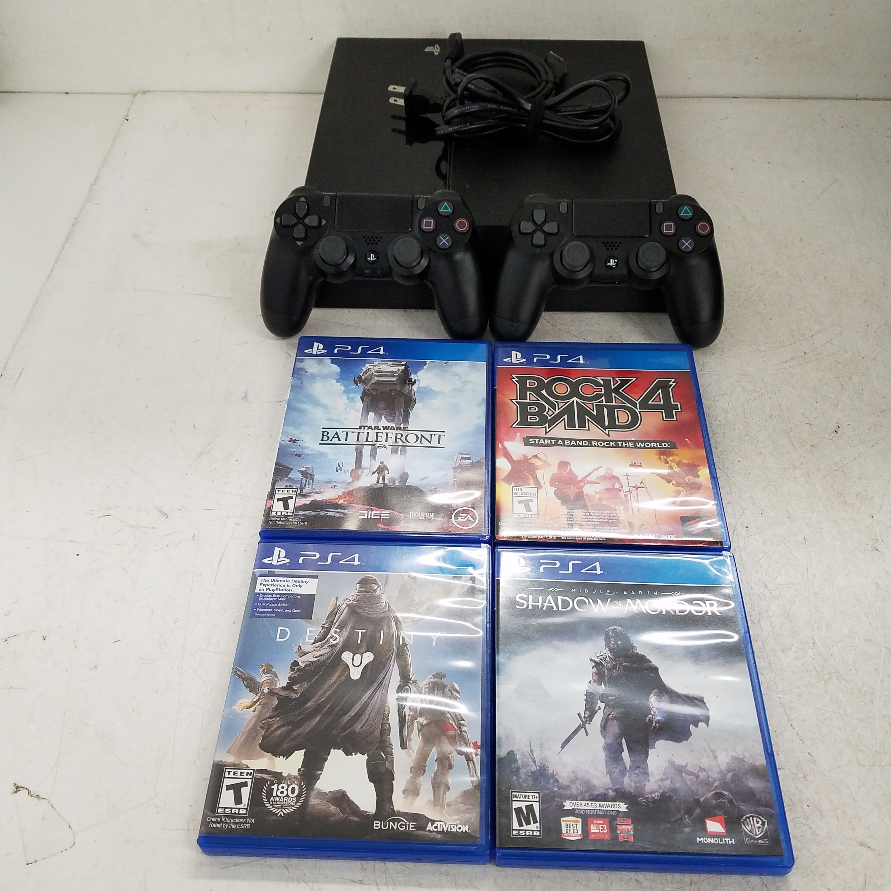 Sony PlayStation 4 500GB Game Console with GTA V and The Last of