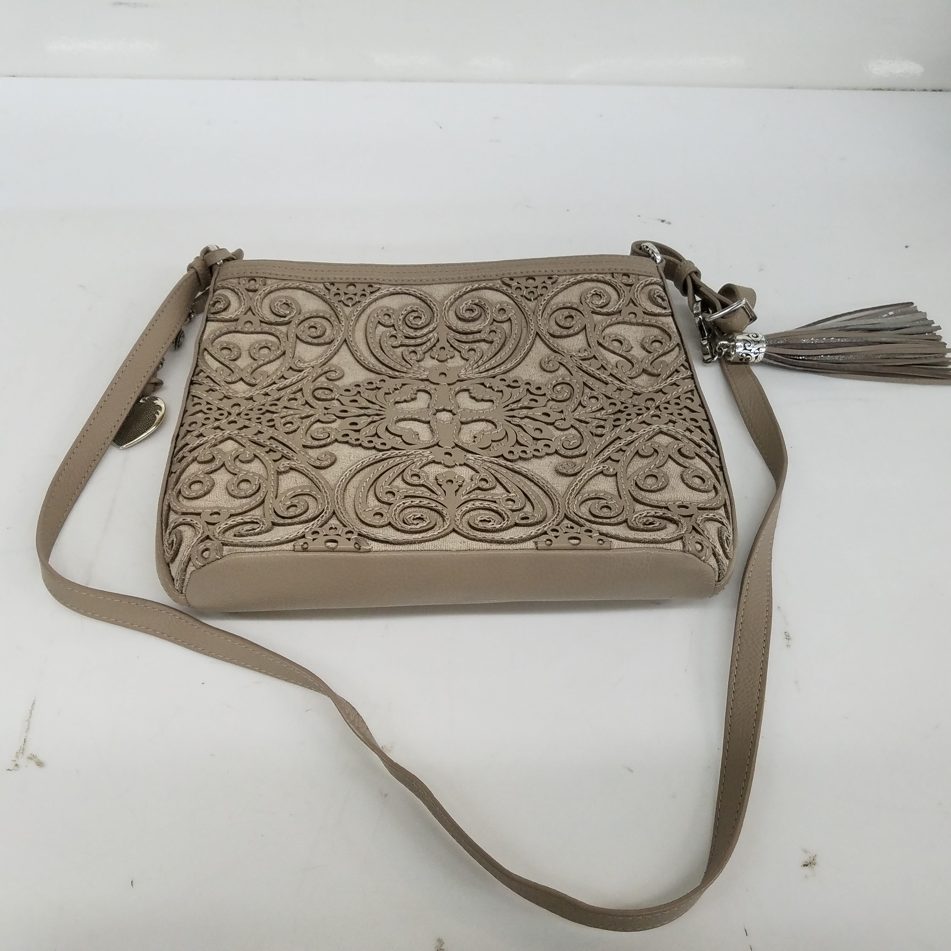 Help me find when this Brighton bag was made (year) and it's og price  please! : r/HelpMeFind