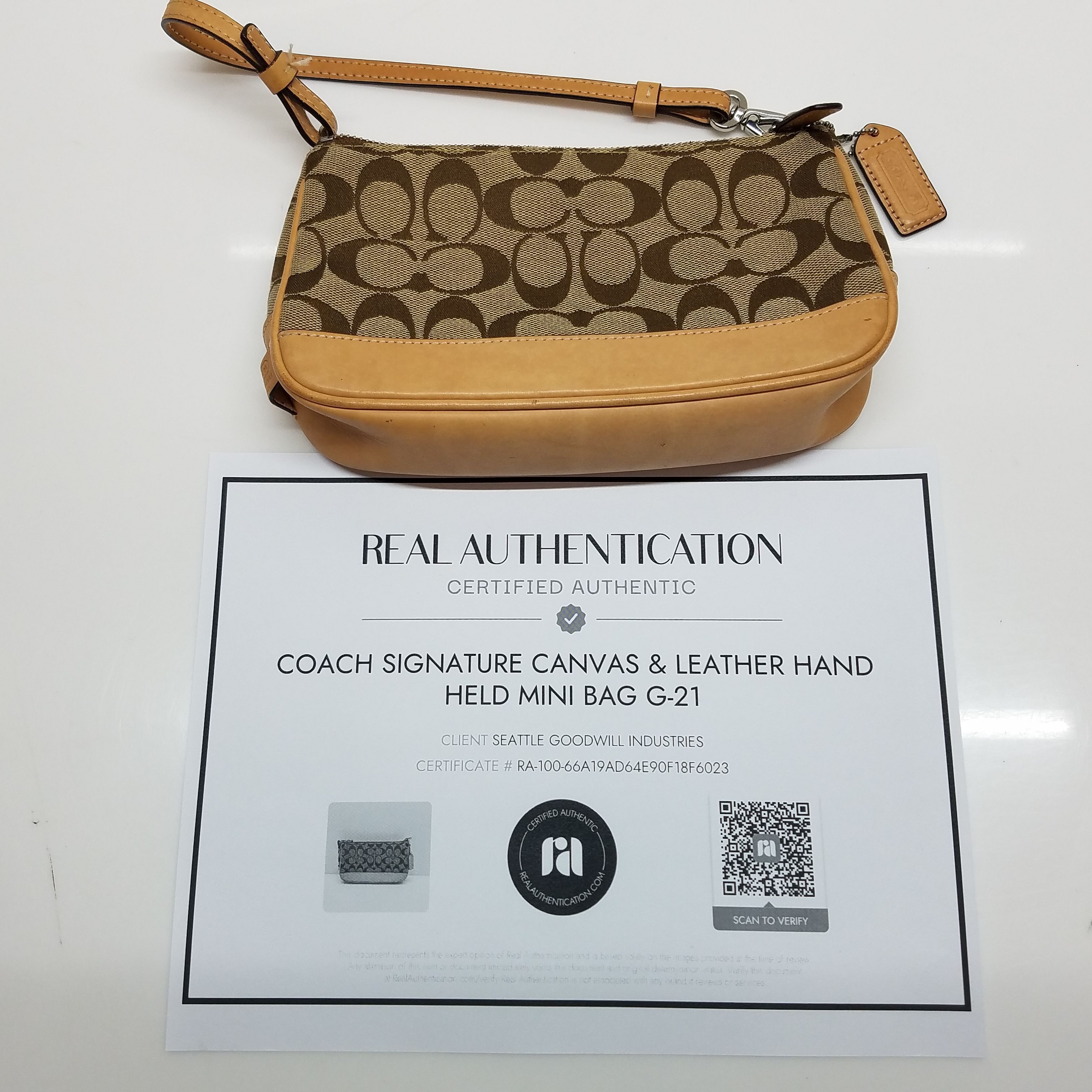 Coach Authenticated Leather Clutch Bag