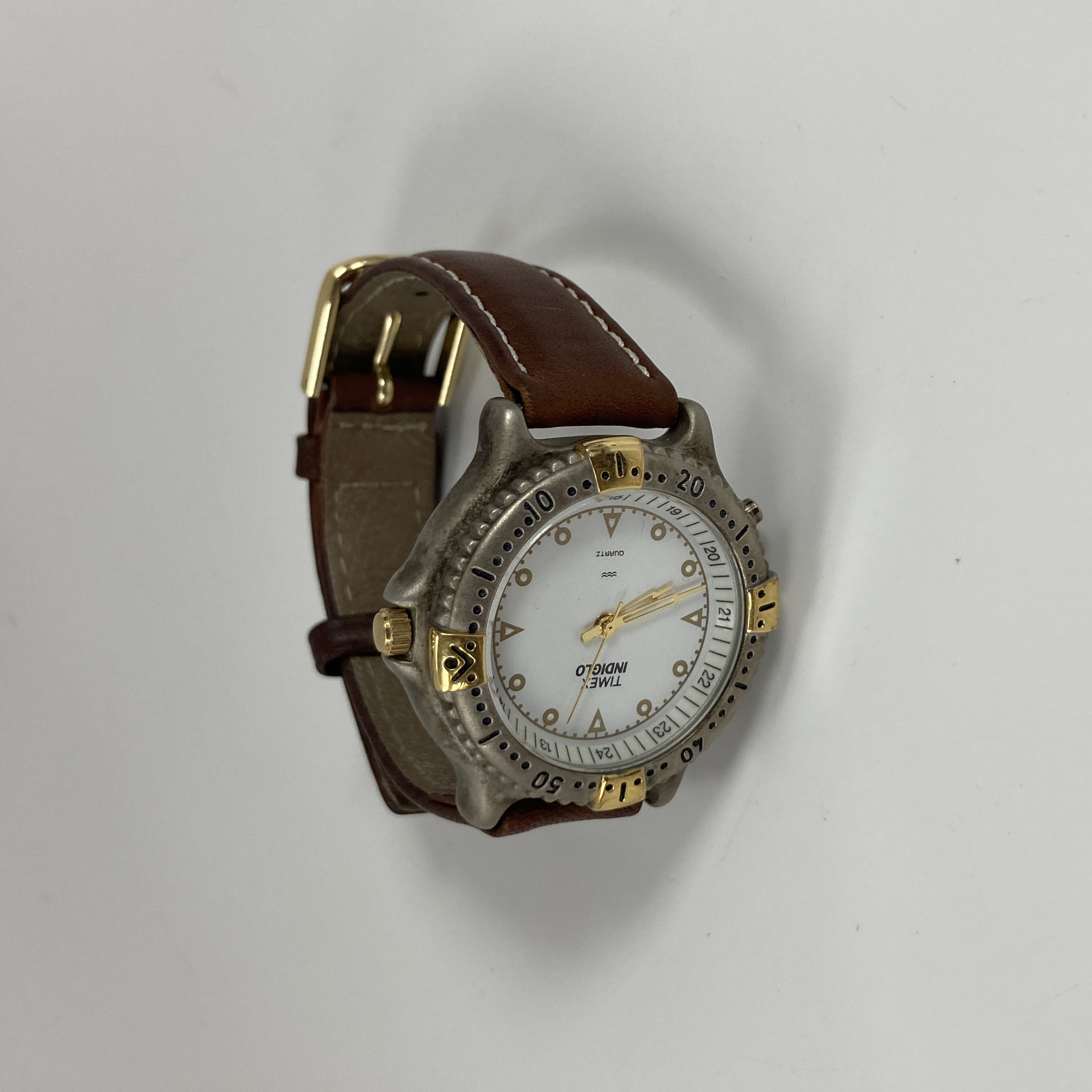 Buy the Designer Timex Indiglo Brown Leather Band Round Quartz Wristwatch |  GoodwillFinds