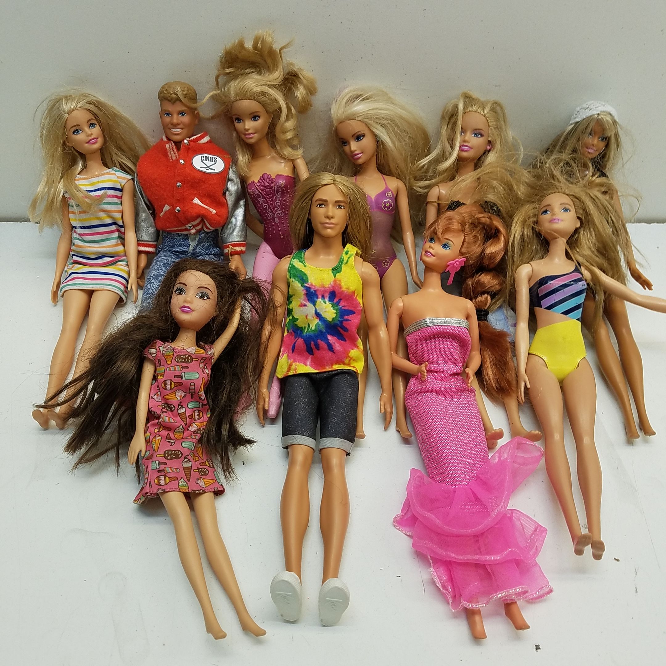 Buy the Bundle of 10 Assorted Mattel Barbie Dolls