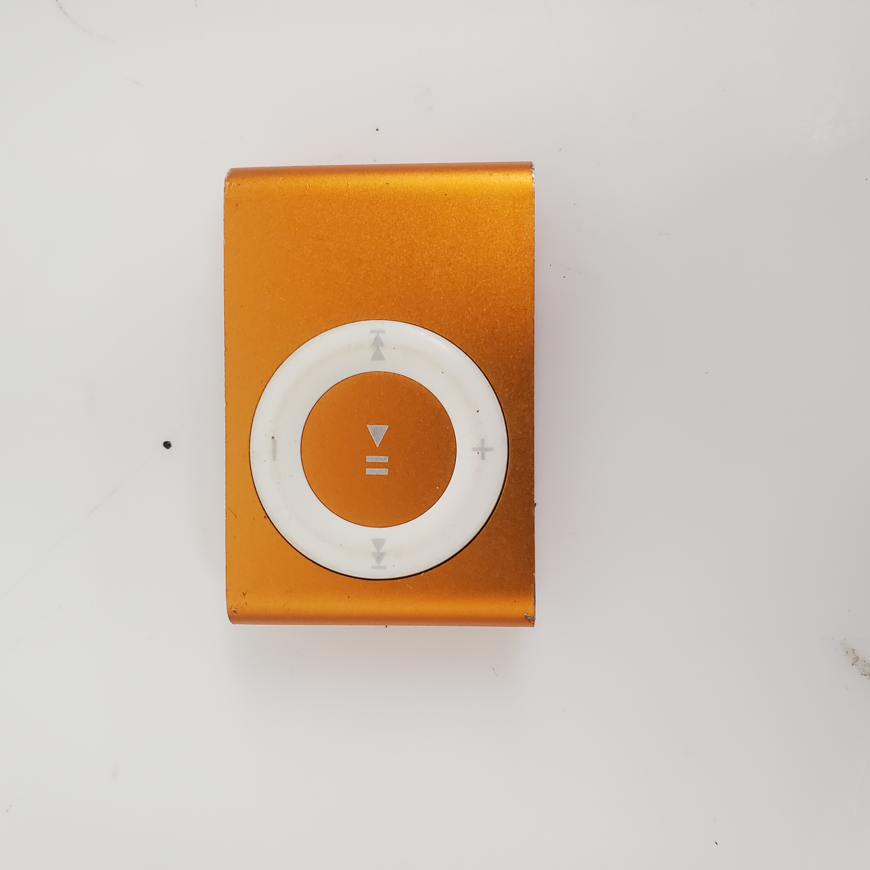 Buy the Apple A1373 Shuffle 4th Generation 2GB MP3 Player in Orange | GoodwillFinds