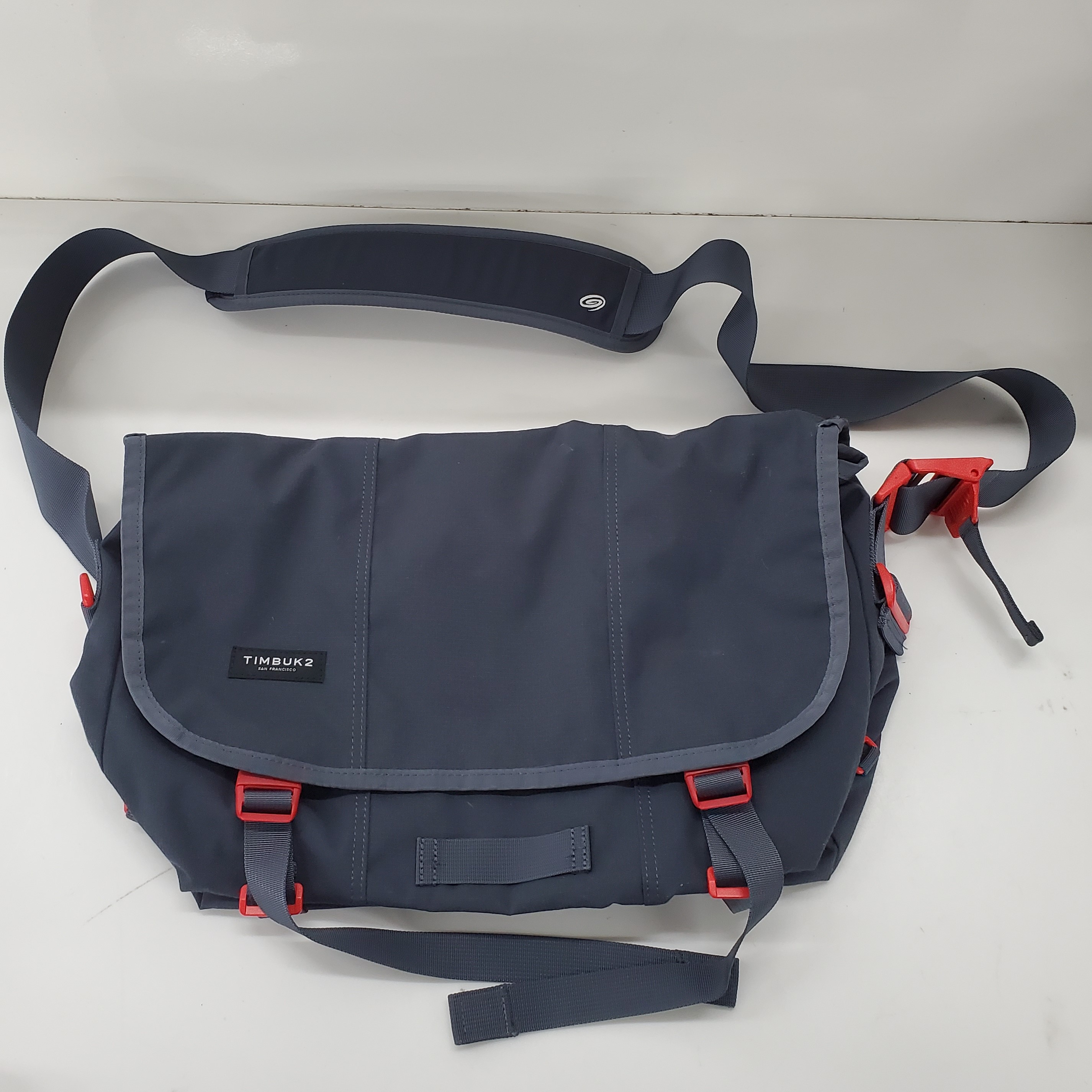 Buy the Timbuk2 Navy Blue Red Accent Classic Messenger Bag